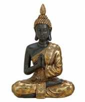 Zwart goud boeddha beeldje biddend 20 cm trend
